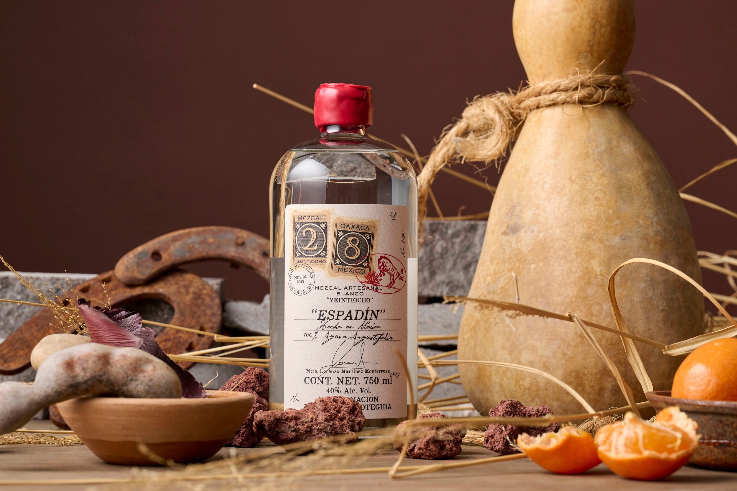 Mezcal 28 Honors Its Mexican Heritage with a Charming Passport-Stamped Bottle