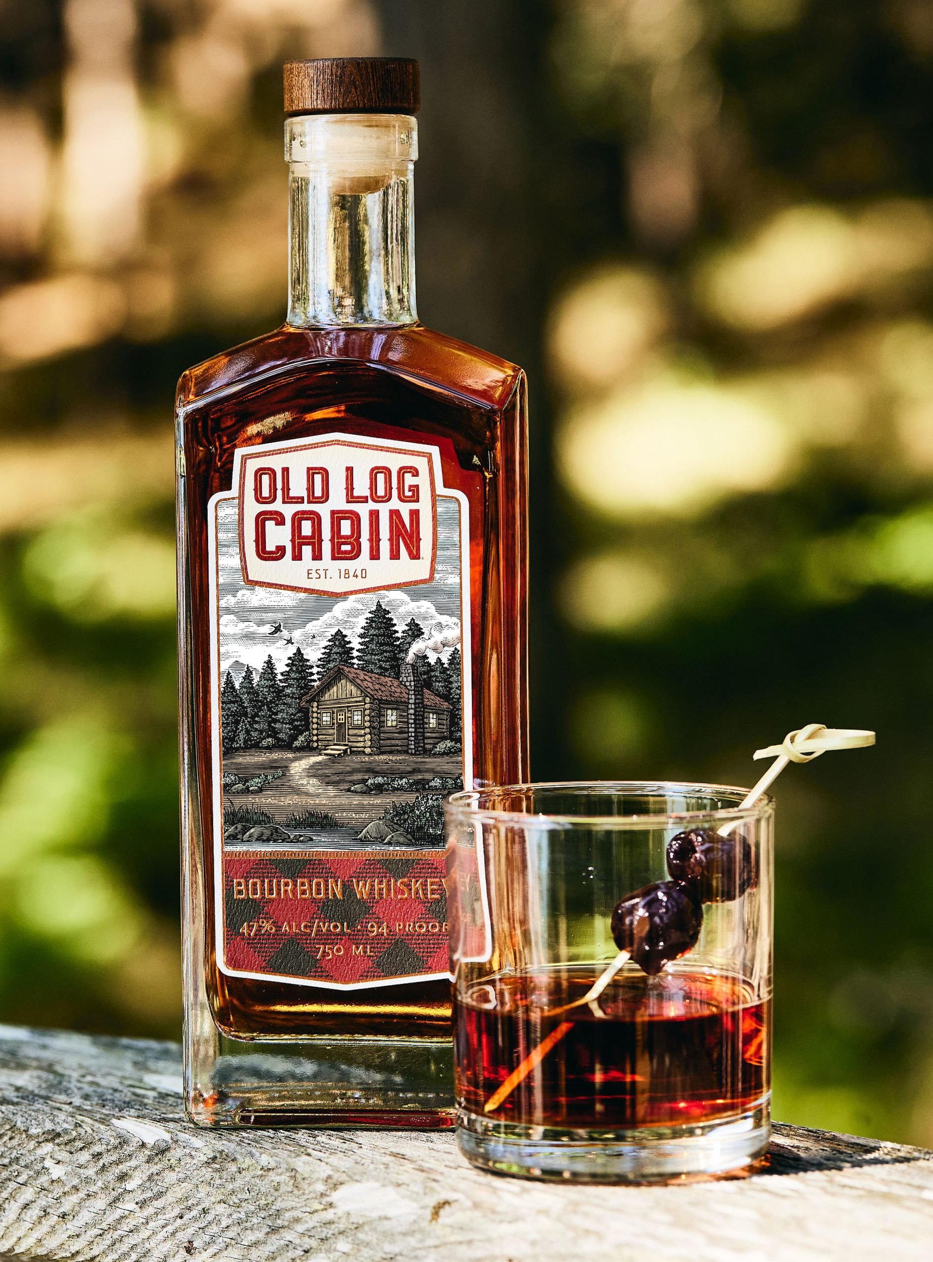 Old Log Cabin Releases a Charming Rustic Bottle Perfect for a Long Weekend in the Woods
