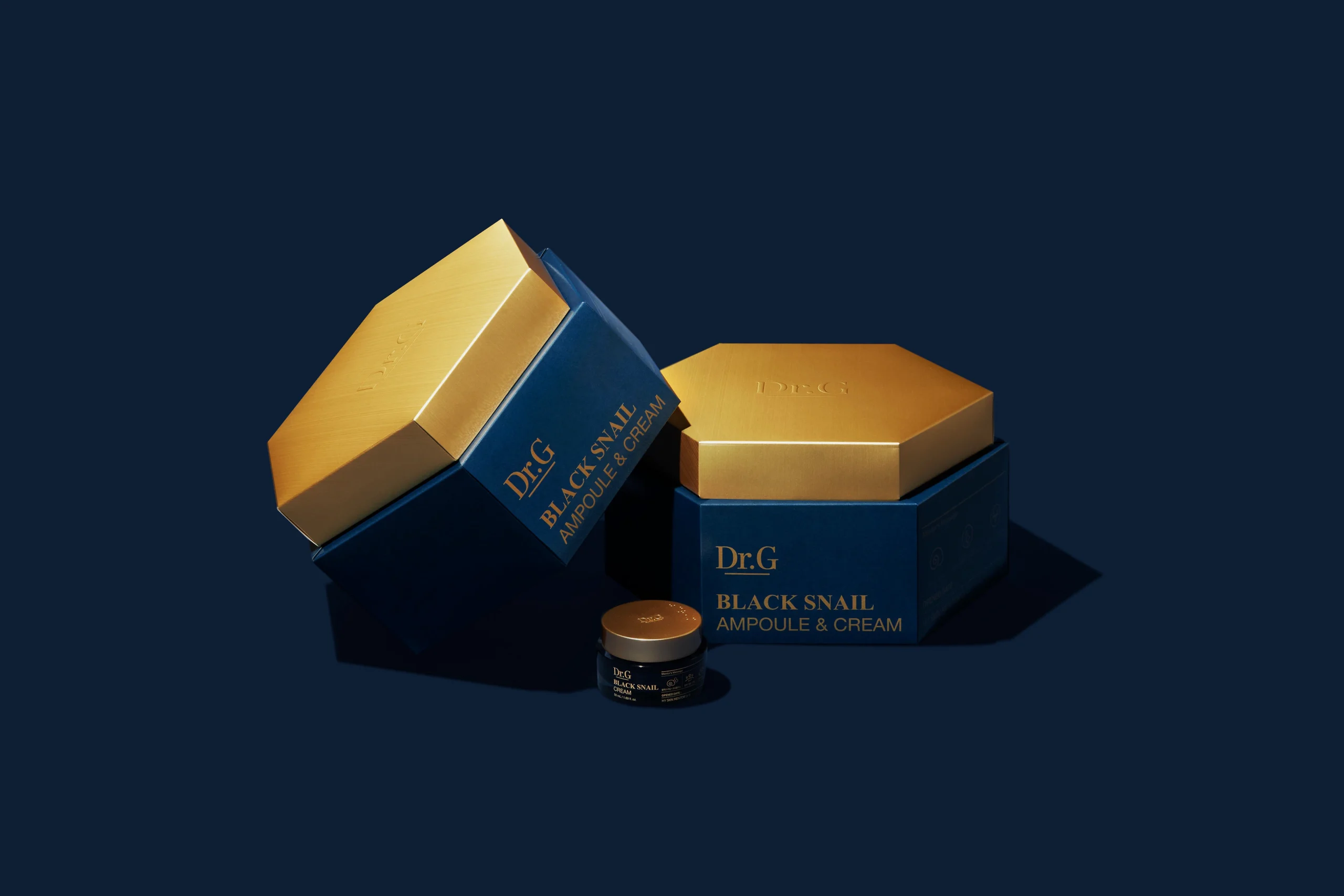 Dr.G’s Black Snail Press Kit Mirrors Snail Mucin Texture