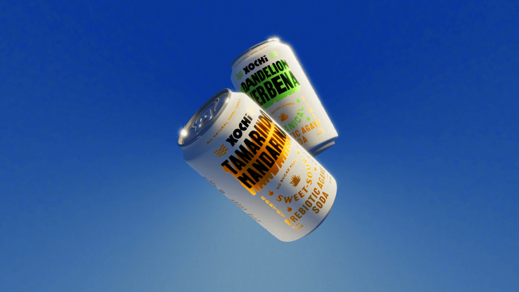 Two cans of prebiotic soda against a blue background, one labeled 'Tamarind' and the other 'Dandelion Verbena.'